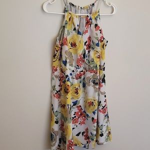 Charlotte Russe white floral dress with tie back. V neckline and back. Size M